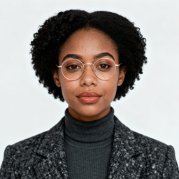 AI-generated portrait of a young woman with short curly hair and glasses, wearing a dark patterned jacket, posed with a neutral expression against a gray background in diffused light.