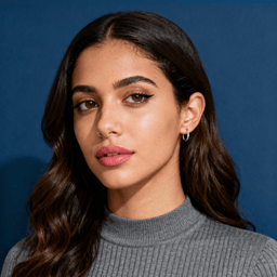 AI-generated portrait of a young woman with long dark hair and defined brows, wearing a simple knit top, posed with a neutral expression against a cool slate background in soft moody light.