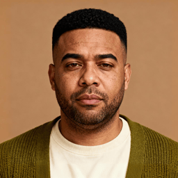 AI-generated portrait of a middle-aged man with short hair and a trimmed beard, wearing a casual knit layer, posed with a neutral expression against a muted green background in soft light.