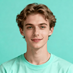 AI-generated portrait of a young man with wavy medium-length hair and clear features, wearing a pastel top, posed with an open smile against a mint background in even studio light.