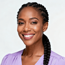 AI-generated portrait of a young woman with braided hair pulled back, wearing a light top, posed with a bright smile against a clean studio background in even lighting.