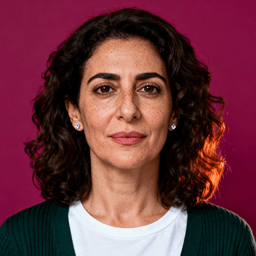 AI-generated portrait of a middle-aged woman with shoulder-length curly hair, wearing a knit cardigan and white top, posed with a calm expression against a muted burgundy background in soft lighting.