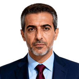 AI-generated portrait of a middle-aged man with short dark hair and trimmed facial hair, wearing a blazer and tie, posed with a serious expression against a transparent background in soft lighting.