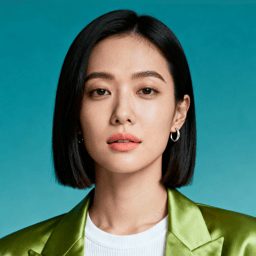 AI-generated portrait of a young woman with a straight bob haircut and defined brows, wearing a satin blazer and top, posed with a composed expression against a teal background in balanced lighting.