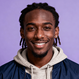 AI-generated portrait of a young man with short locs and light facial hair, wearing a hoodie under a casual jacket, posed with a warm smile against a soft purple background in diffused studio light.