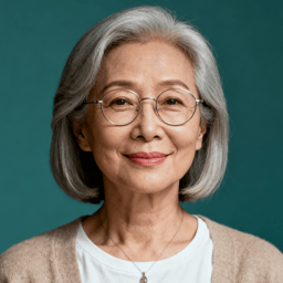 AI-generated portrait of a middle-aged woman with short gray hair and round glasses, wearing a light cardigan and white top, posed with a gentle expression against a teal background in soft diffused light.