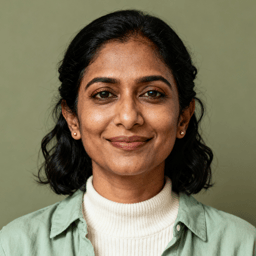 AI-generated portrait of a young woman with shoulder-length dark hair, wearing a light jacket over a ribbed top, posed with a soft smile against a muted green background in diffused daylight.