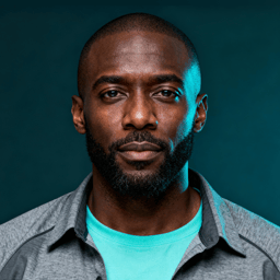 AI-generated portrait of a middle-aged man with a shaved head and short beard, wearing a casual jacket and t-shirt, posed with a neutral expression against a dark teal background in cool studio lighting.