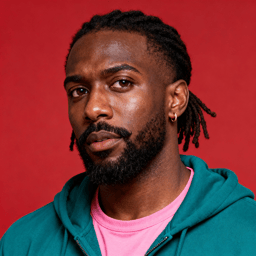 AI-generated portrait of a young man with short locs and a trimmed beard, wearing a green hoodie over a pink shirt, posed with a thoughtful expression against a red background in diffused light.