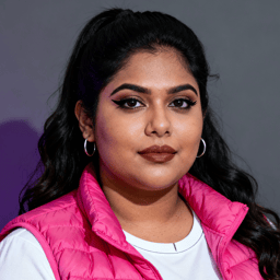 AI-generated portrait of a young woman with long dark hair and defined eye makeup, wearing a white shirt and pink vest, posed with a composed expression against a gray background in cool light.