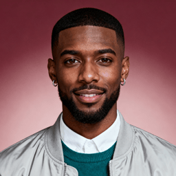 AI-generated portrait of a young man with short hair and trimmed beard, wearing a bomber jacket over a collared shirt and sweater, posed with a relaxed smile against a muted red studio background in soft light.