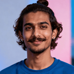AI-generated portrait of a young man with tied-back hair and a mustache, wearing a casual sweatshirt, posed with a calm smile against a soft LED-lit background.