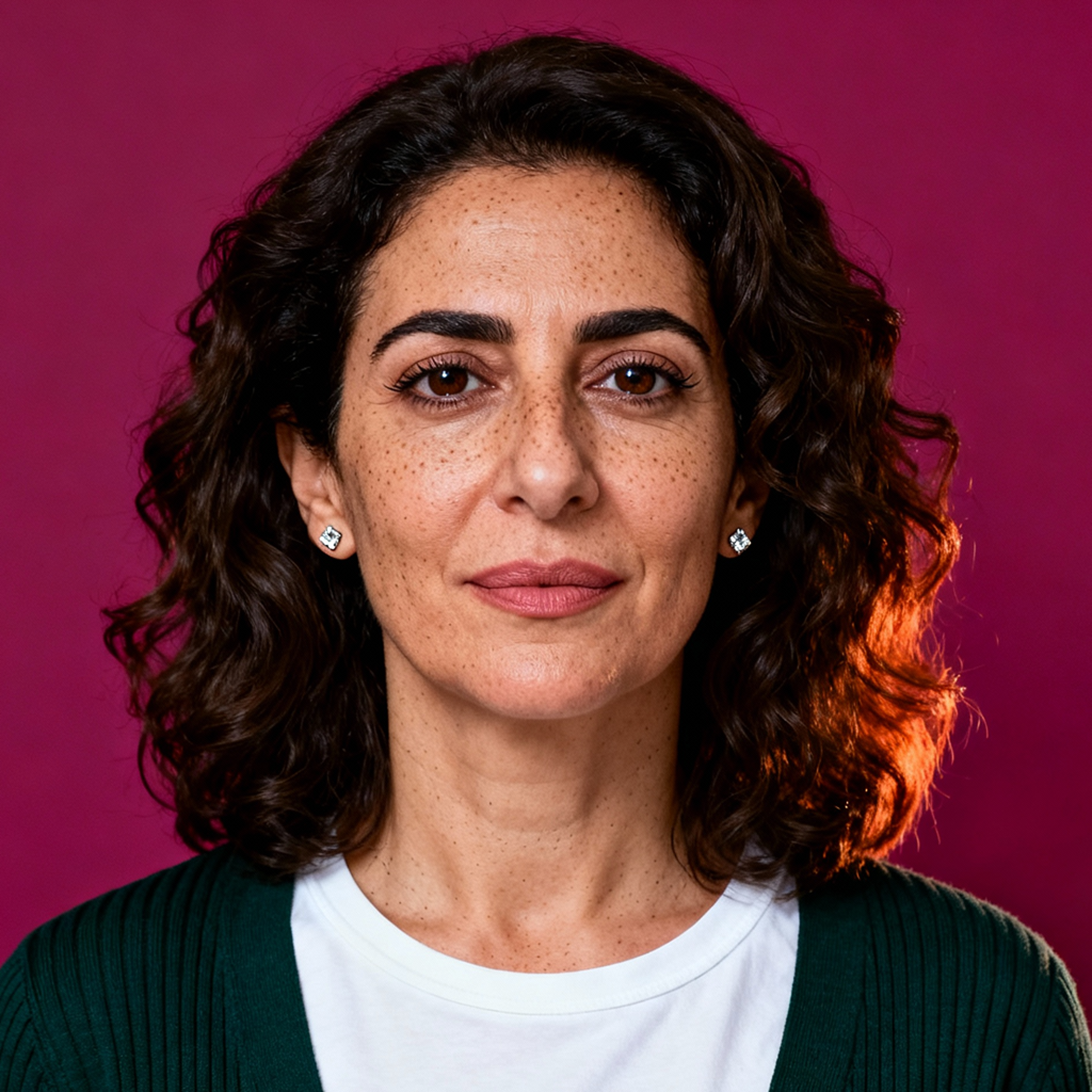 AI-generated portrait of a middle-aged woman with shoulder-length curly hair, wearing a knit cardigan and white top, posed with a calm expression against a muted burgundy background in soft lighting.