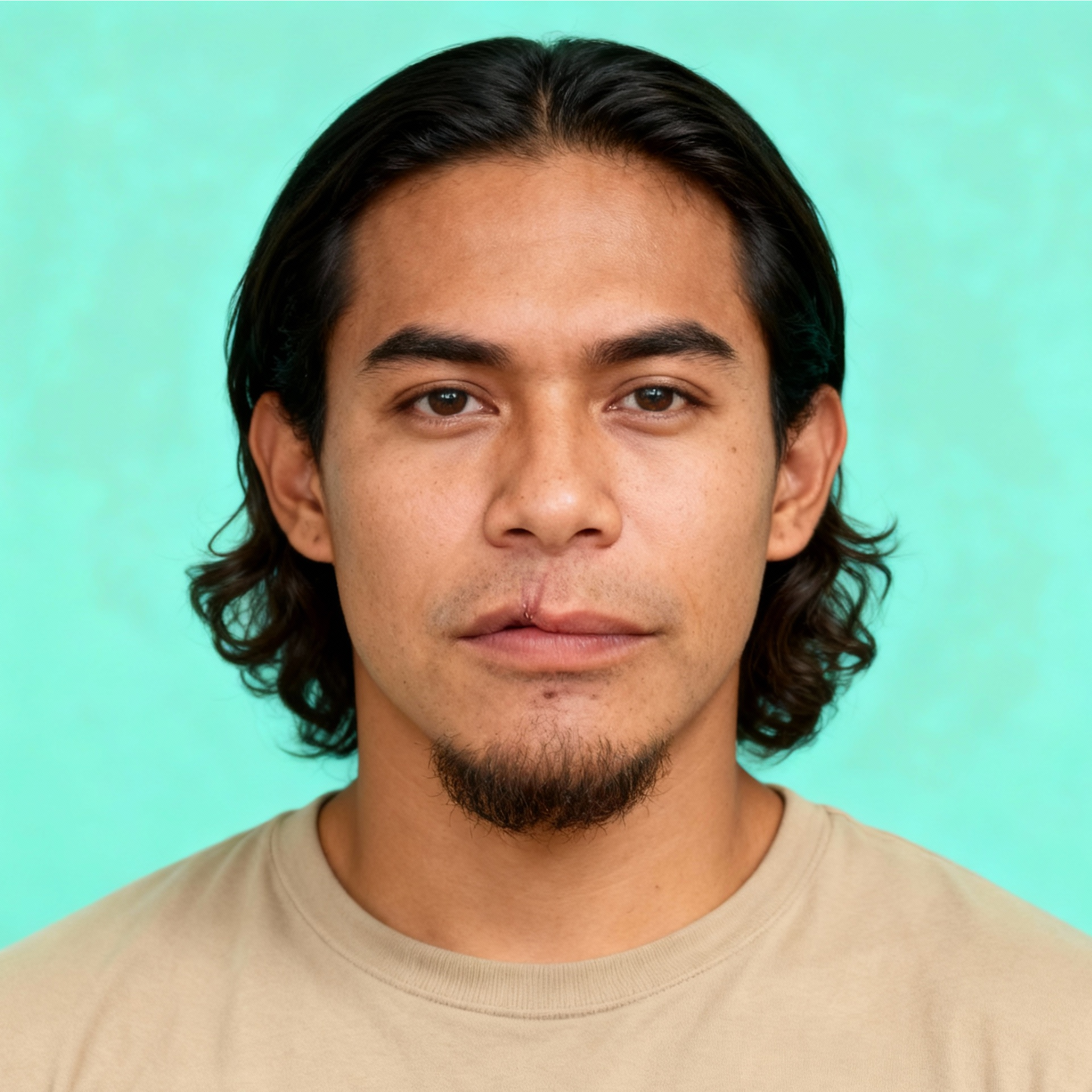AI-generated portrait of a young man with shoulder-length hair and light facial hair, wearing a casual neutral shirt, posed with a neutral expression against a soft teal background in even studio lighting.