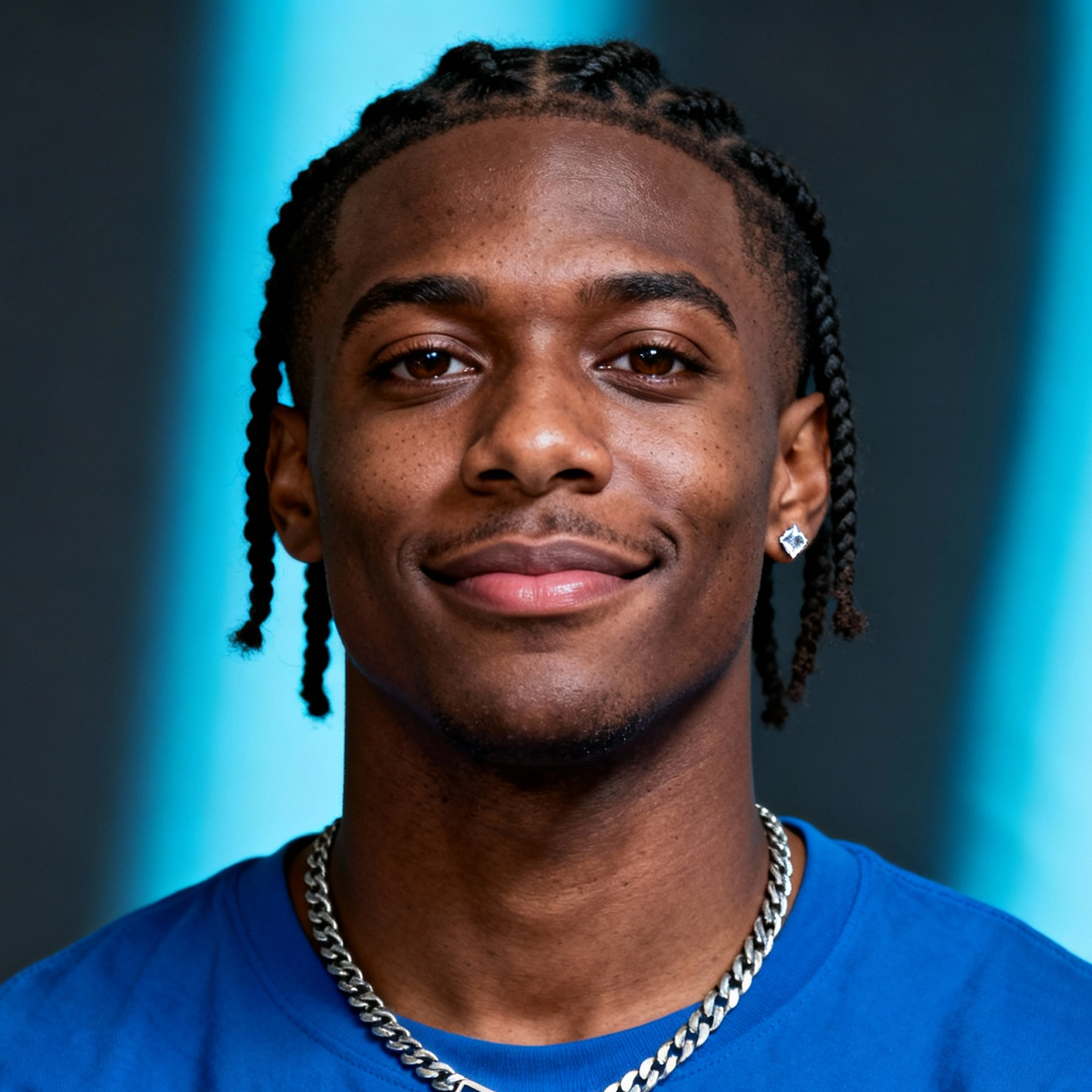 AI-generated portrait of a young man with braided hair and defined brows, wearing a blue top and chain necklace, posed with a relaxed smile against a cool-toned background in bright lighting.